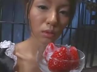Pretty Asian teen made eats strawberries with sperm cover