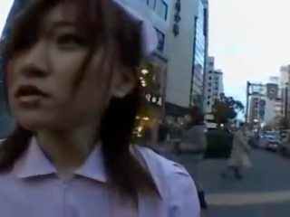 Naughty Asian girlfriend is pissing in public